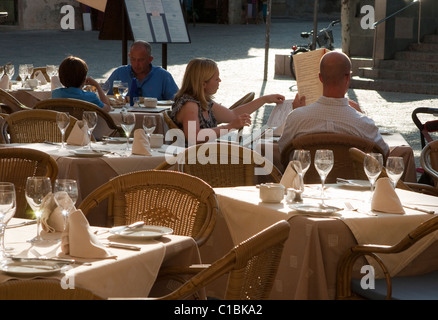 tourists in restaurant external outside Majorca Mallorca Spain Balearic Stock Photo