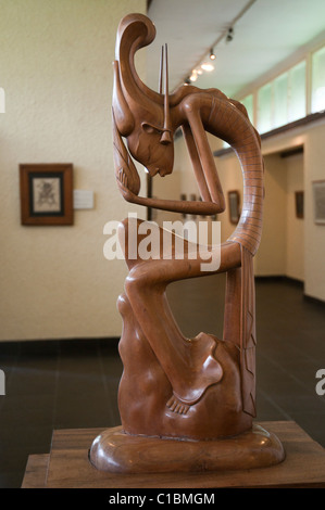 Carving of Dewi Sri the rice goddess by the woodcarver Ketut Djedeng in the Museum Puri Lukisan in Ubud Bali Indonesia Stock Photo