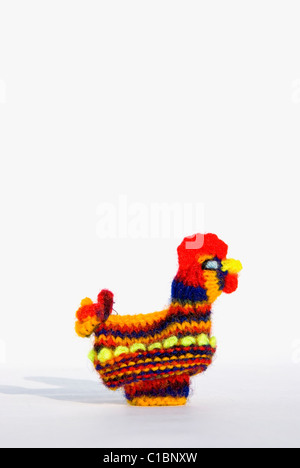 Cute Easter chick knitted from colored yarn Stock Photo
