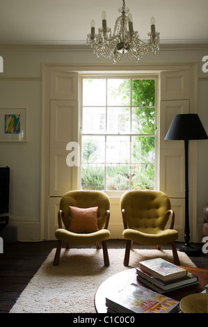 1840s London Victorian terrace decorated with vintage and antique furniture in a contemporary style. Stock Photo