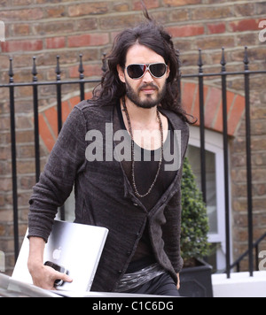 Russell Brand leaving home wearing his trademark tight-fitting trousers London, England - 07.04.09 Stock Photo