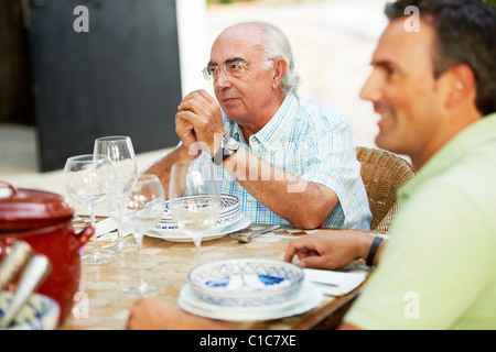 Father and son having lunch Stock Photo