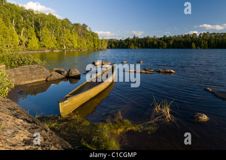 A solo canoe ready to go on Alice in the Boundary Waters, Minnesota. Stock Photo