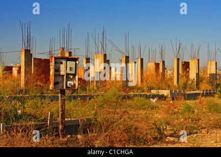 A site of villa's that have been partly built and then left abandoned in the Aydin district of Turkey Stock Photo