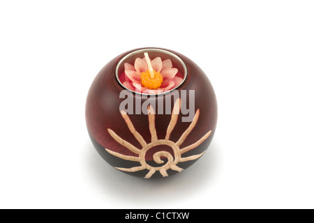 Candlesticks, wooden balls with candle on white background Stock Photo