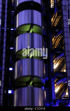 Abstract Architectural Detail of The Lloyds of London Building at Dusk, Leadenhall Street, London, England, UK Stock Photo