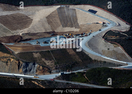 aerial view above disposal site for material excavated from Devil's Slide tunnel construction California Stock Photo