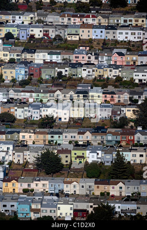 Aerial view of a residential neighborhood with rows of houses, green ...