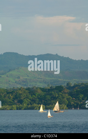 Madagascar, Island of Nosy Be. Local sailboats off the coast of Nosy Be. Stock Photo