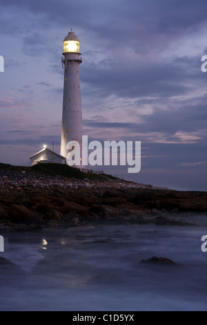 Slangkop Lighthouse at Sunset, Kommetjie, Near Cape Point, on the Atlantic Cost, South Africa Stock Photo