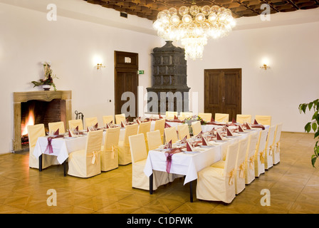 Tables set for a festive dinner - Interior of a manor house Stock Photo
