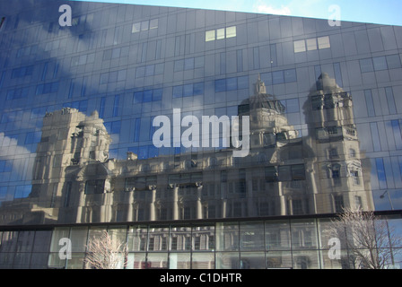The Port Of Liverpool Building, Pier Head , Liverpool Reflected in a Modern Building Stock Photo
