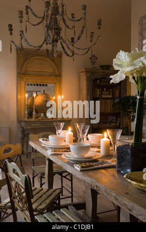 London studio flat and sleeping gallery furnished with distressed Franco-Italian 18th century furniture. Stock Photo