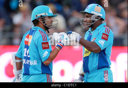 Sachin Tendulker and Sanath Jayasuriya of Mumbai Indians during the IPL Twenty20 match with Kolkata Knight Riders playing Stock Photo