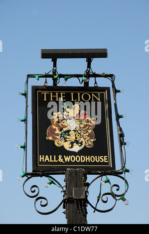 Sign for The Lion public house at Pagham Stock Photo