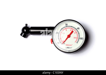 Plastic tyre-pressure gauge on white background Stock Photo