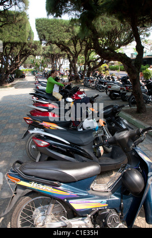 Long Row of Parked Motorcycles in Nha Trang Stock Photo