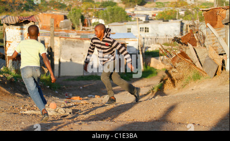 CHILDREN FOOTBALL BRIGHTON TOWNSHIP SOUTH AFRICA NEW BRIGHTON TOWNSHIP NEW BRIGHTON TOWNSHIP PORT ELIZABETH SOUTH AFRICA 01 Ju Stock Photo