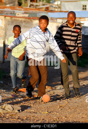 CHILDREN FOOTBALL BRIGHTON TOWNSHIP SOUTH AFRICA NEW BRIGHTON TOWNSHIP NEW BRIGHTON TOWNSHIP PORT ELIZABETH SOUTH AFRICA 01 Ju Stock Photo