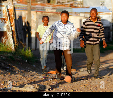 CHILDREN FOOTBALL BRIGHTON TOWNSHIP SOUTH AFRICA NEW BRIGHTON TOWNSHIP NEW BRIGHTON TOWNSHIP PORT ELIZABETH SOUTH AFRICA 01 Ju Stock Photo