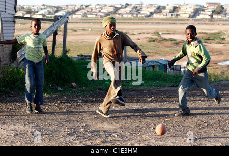 CHILDREN FOOTBALL BRIGHTON TOWNSHIP SOUTH AFRICA NEW BRIGHTON TOWNSHIP NEW BRIGHTON TOWNSHIP PORT ELIZABETH SOUTH AFRICA 01 Ju Stock Photo