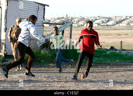 CHILDREN FOOTBALL BRIGHTON TOWNSHIP SOUTH AFRICA NEW BRIGHTON TOWNSHIP NEW BRIGHTON TOWNSHIP PORT ELIZABETH SOUTH AFRICA 01 Ju Stock Photo