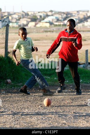 CHILDREN FOOTBALL BRIGHTON TOWNSHIP SOUTH AFRICA NEW BRIGHTON TOWNSHIP NEW BRIGHTON TOWNSHIP PORT ELIZABETH SOUTH AFRICA 01 Ju Stock Photo