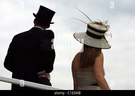 Man in top hat and woman in hat, Epsom, United Kingdom Stock Photo