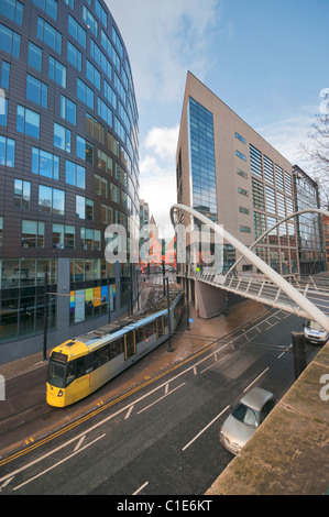 Metro tram on the approach to Piccadilly Station on London Road  Manchester England