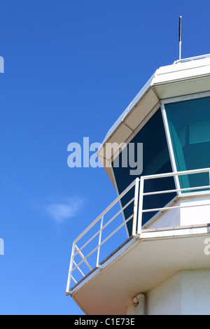 Part of aerodrome control tower against clear sky, with copy space Stock Photo