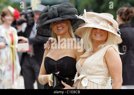 Elegantly dressed women in hats, Ascot, United Kingdom Stock Photo