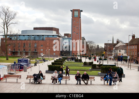 The newly re-opened Royal Shakespeare Theatre in Stratford-Upon-Avon, UK. People are sitting in the Bancroft Gardens Stock Photo