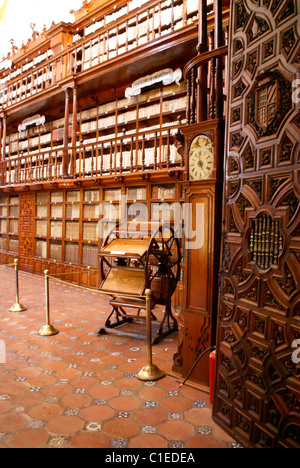 Multiple book reader or lectern and shelving, Biblioteca Palafoxiana library in the city of Puebla, Mexico Stock Photo