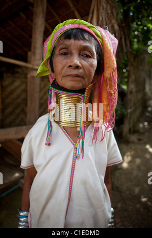 Long Neck Karen old woman standing at village, Ban Nai Soi, Mae Hong Son, Thailand Stock Photo