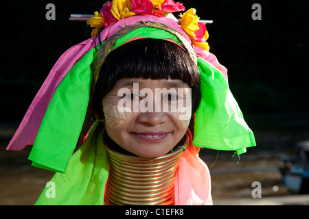 Long Neck Karen woman back to the refugee village from small Veg. farm, Huay Pu Keng, Mae Hong Son, Thailand Stock Photo