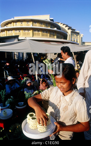 Cambodia, Phnom Penh city, Old French Market Child selling jasmin bangles Stock Photo