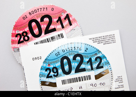 UK, Europe. New car tax disc expiring on 29th February 2012 leap year with old expired disc Stock Photo