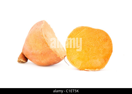 Pile of sweet potatoes called batatas over a white background Stock Photo