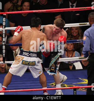 Manny Pacquiao knocks out Ricky Hatton in 2:59 seconds in the second round at the MGM Grand Garden Arena. Referee Kenny Bayless Stock Photo