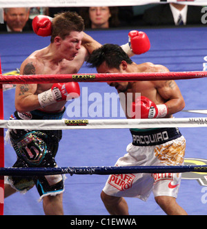 Manny Pacquiao knocks out Ricky Hatton in 2:59 seconds in the second round at the MGM Grand Garden Arena. Referee Kenny Bayless Stock Photo