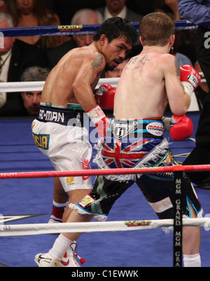 Manny Pacquiao knocks out Ricky Hatton in 2:59 seconds in the second round at the MGM Grand Garden Arena. Referee Kenny Bayless Stock Photo