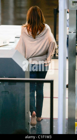 Supermodel Cindy Crawford has to take her shoes off as she passes through security to board a flight from LAX to New York Los Stock Photo