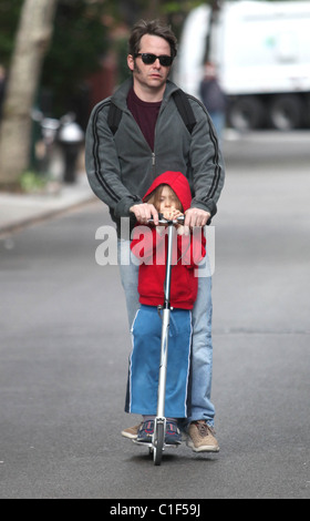 Matthew Broderick plays the doting father as he takes son James Broderick to school on a scooter New York City, USA - 11.05.09 Stock Photo