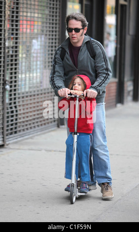 Matthew Broderick plays the doting father as he takes son James Broderick to school on a scooter New York City, USA - 11.05.09 Stock Photo