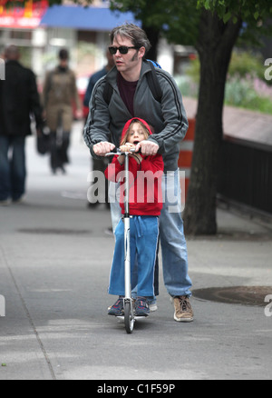 Matthew Broderick plays the doting father as he takes son James Broderick to school on a scooter New York City, USA - 11.05.09 Stock Photo