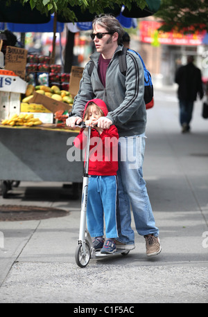 Matthew Broderick plays the doting father as he takes son James Broderick to school on a scooter New York City, USA - 11.05.09 Stock Photo