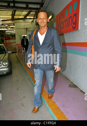 Perry Fenwick who plays Billy Mitchell in BBC soap 'Eastenders' leaving the 'This Morning' studios London, England - 08.05.09 Stock Photo