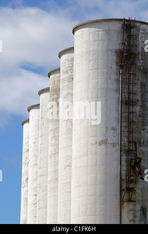 Large industrial silos in a row Stock Photo
