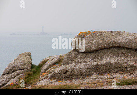 Longships lighthouse and rocks off Land's End, Cornwall Stock Photo