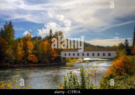 Covered Bridge over McKenzie River Oregon in the Fall Stock Photo